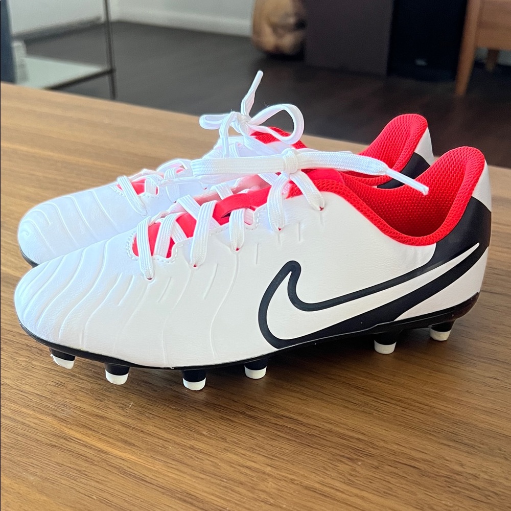 Nike White Soccer Cleats with Red Interior and Black Swoosh